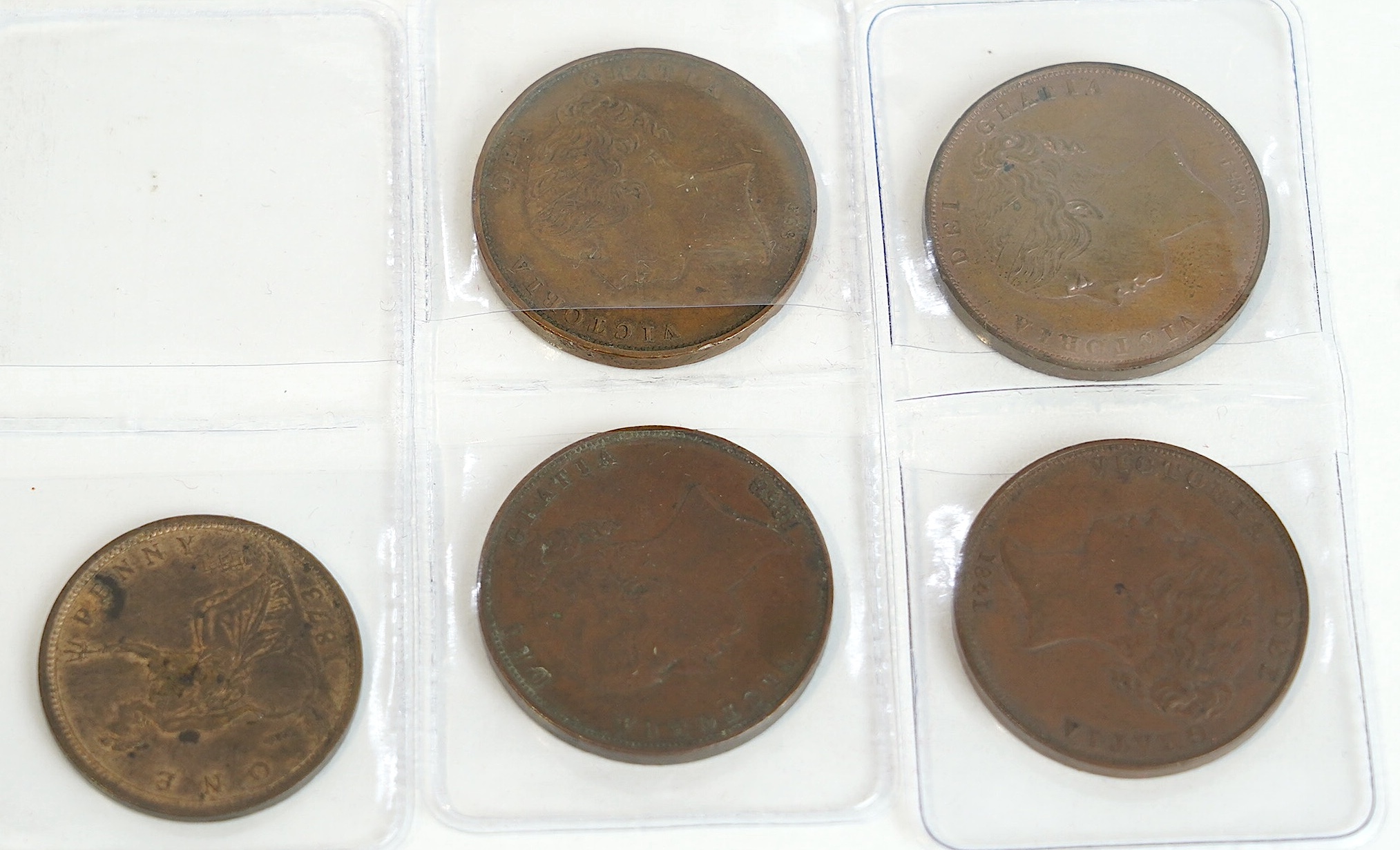 British coins, Victoria (1837-1901), four copper one penny coins, 1841, good VF, 1854, about UNC with some lustre, 1855 and 1858, both VF, together with an 1873 bronze one penny, UNC with some original lustre (5)